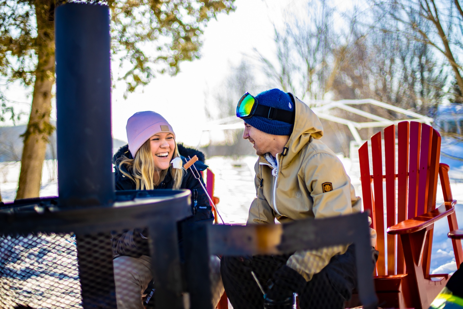 Winter couple around the fireplace